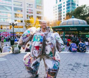 Trash Man's Suit Message: Waste Reduction